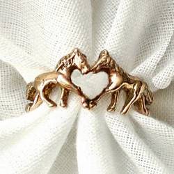 a horse ring with a heart center